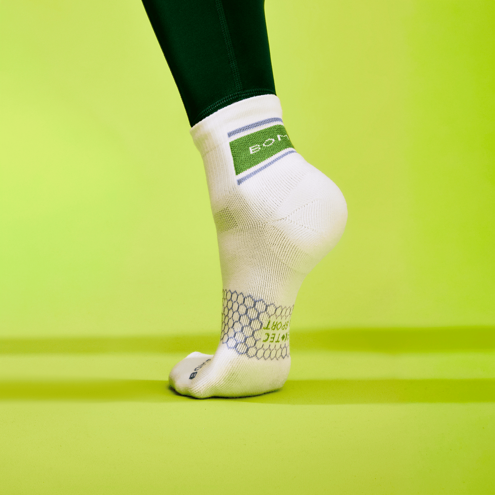 official-bombas::10060-white-rollinggreen-adult-unisex-onmodel-0-transparent-v3.png