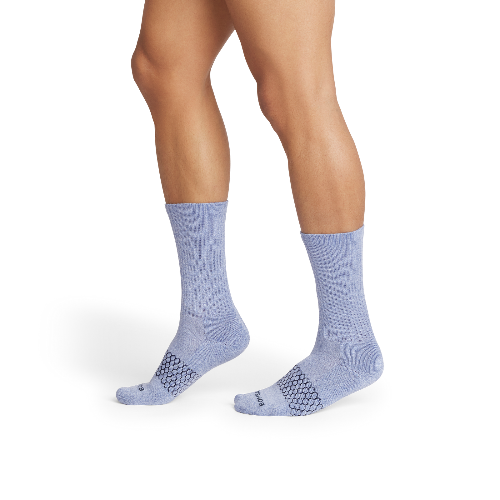 official-bombas::3129-oysterblue-midnightnavy-adult-male-onmodel-2-transparent.png