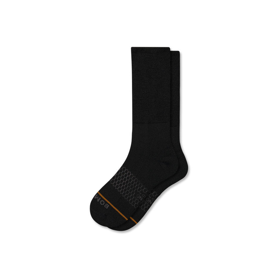official-bombas::9811-black-adult-unisex-layflat-1-transparent.png