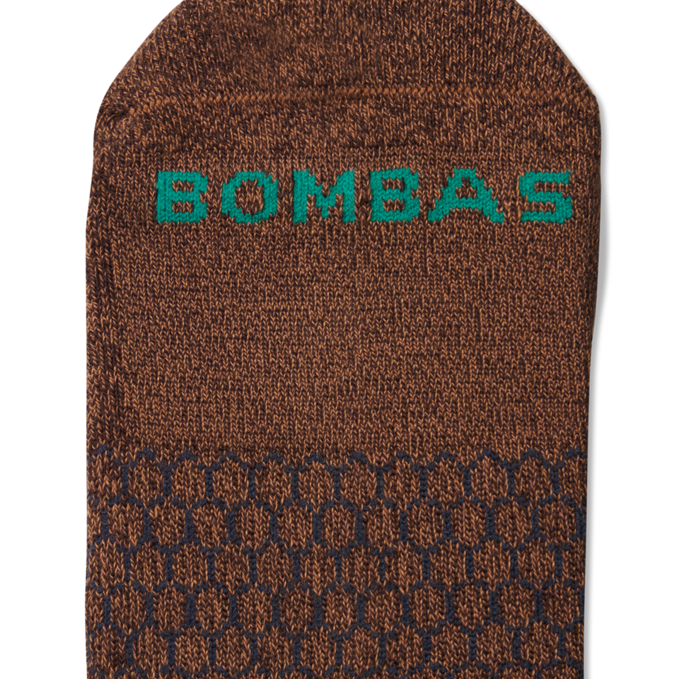 official-bombas::9813-darkespresso-midnightnavy-adult-male-detail-3-transparent.png